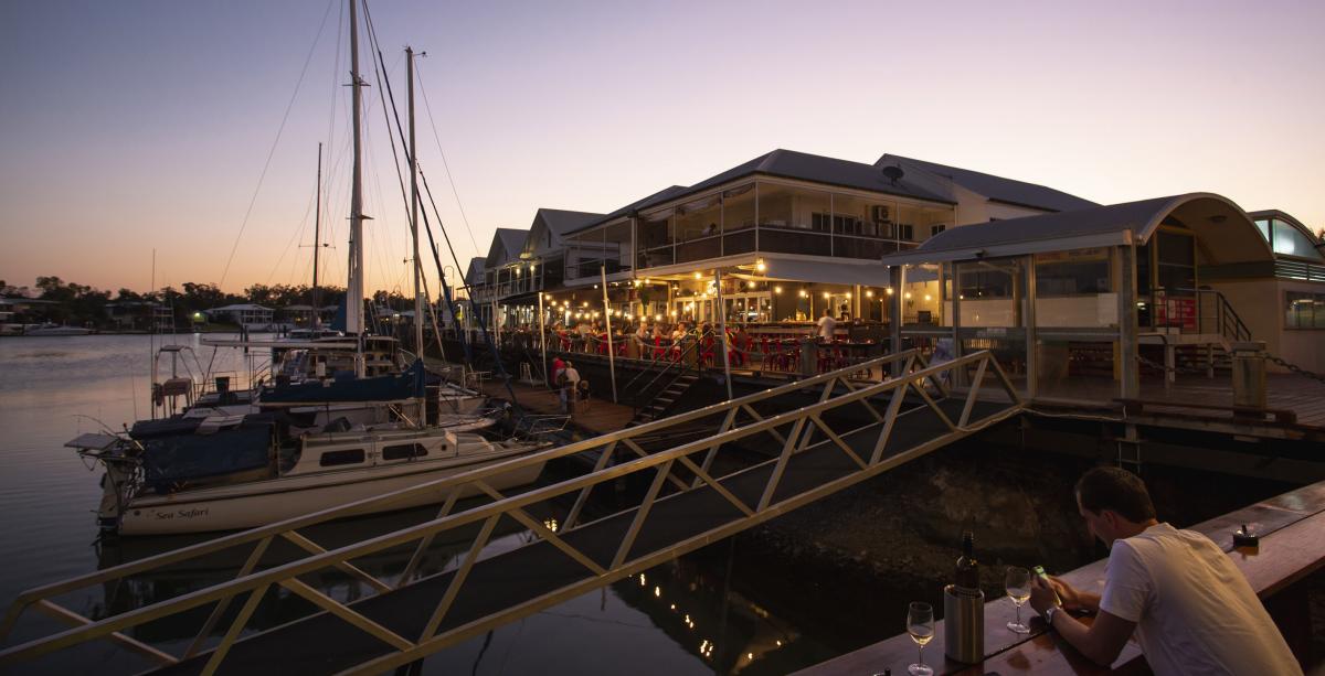 Image courtesy of Tourism Australia Night lights over the water at Cullen Bay Marina