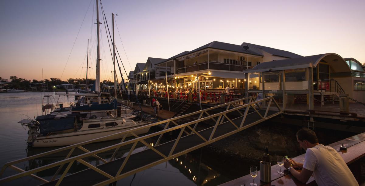 Night lights over the water at Cullen Bay Marina