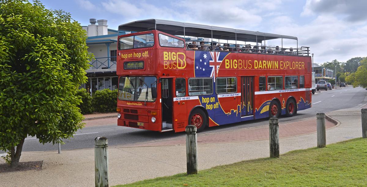 Big Bus Darwin explorer driving through Cullen Bay