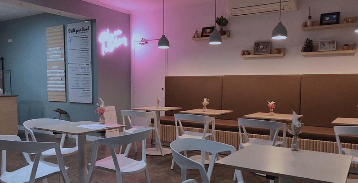 chairs and tables in a cafe setting